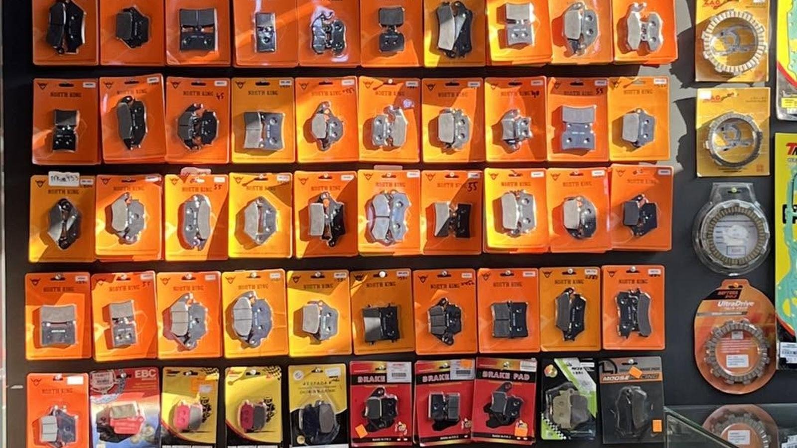 Wall of motorcycle brake pads and clutch kits