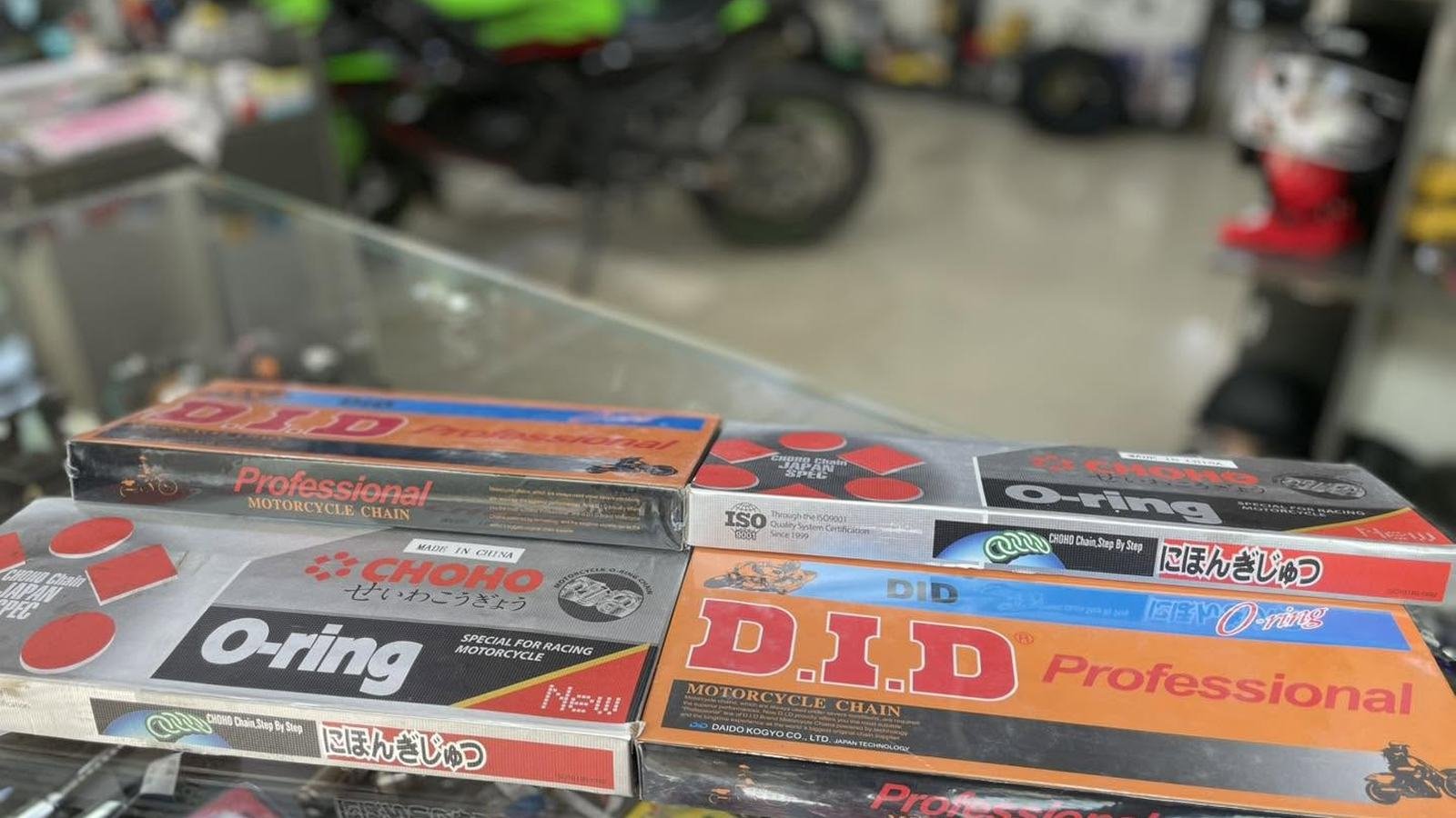 D.I.D and CHOHO motorcycle chains in boxes