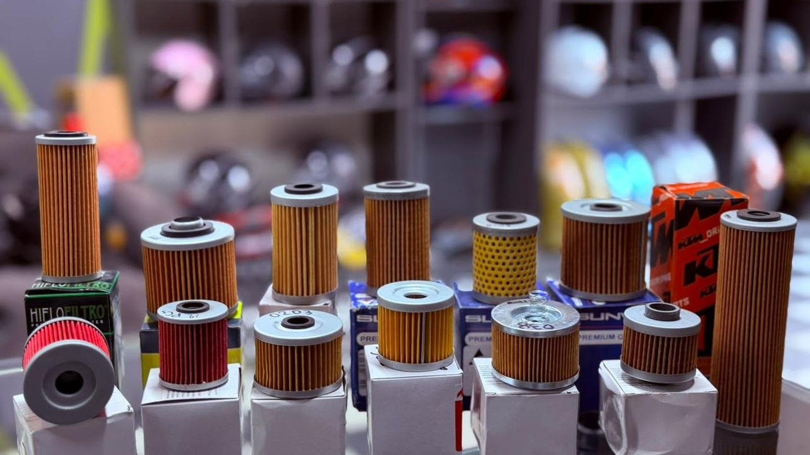 Motorcycle oil filters of different sizes on the counter